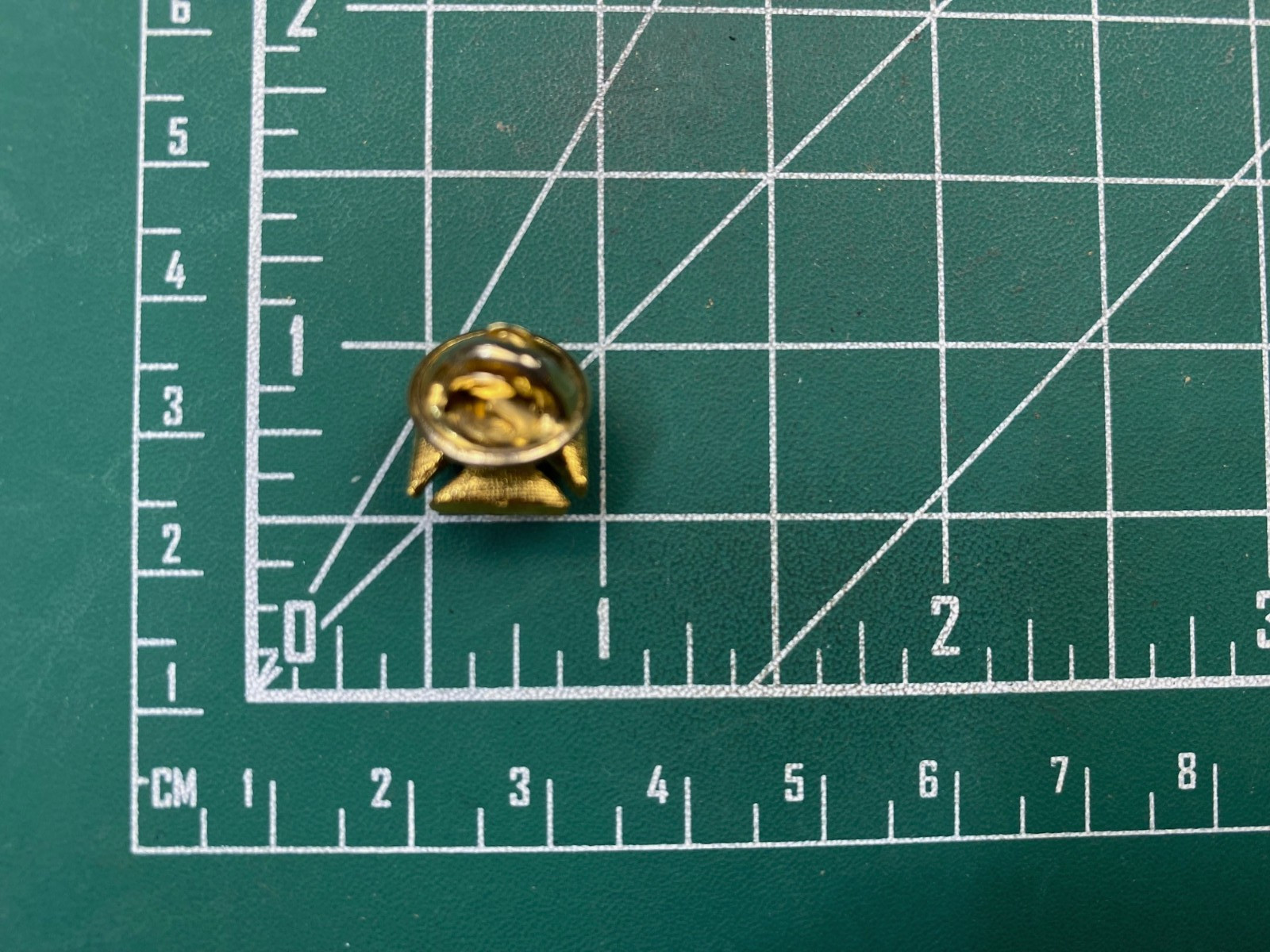 Small Jeweled Gold Tone Iron Cross Pin