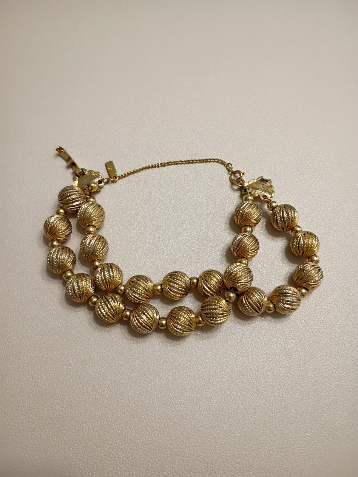 VTG Gold Tone Double Strand Ribbed Bead Bracelet and Earings Both Signed monet
