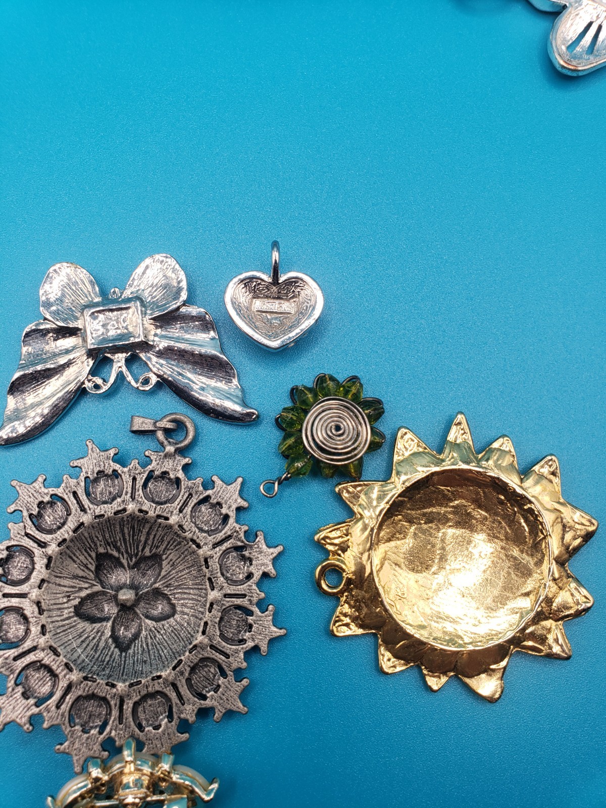 Mixed Costume Jewelry Lot: Pendants, Brooches, Rhinestone Bracelet & More