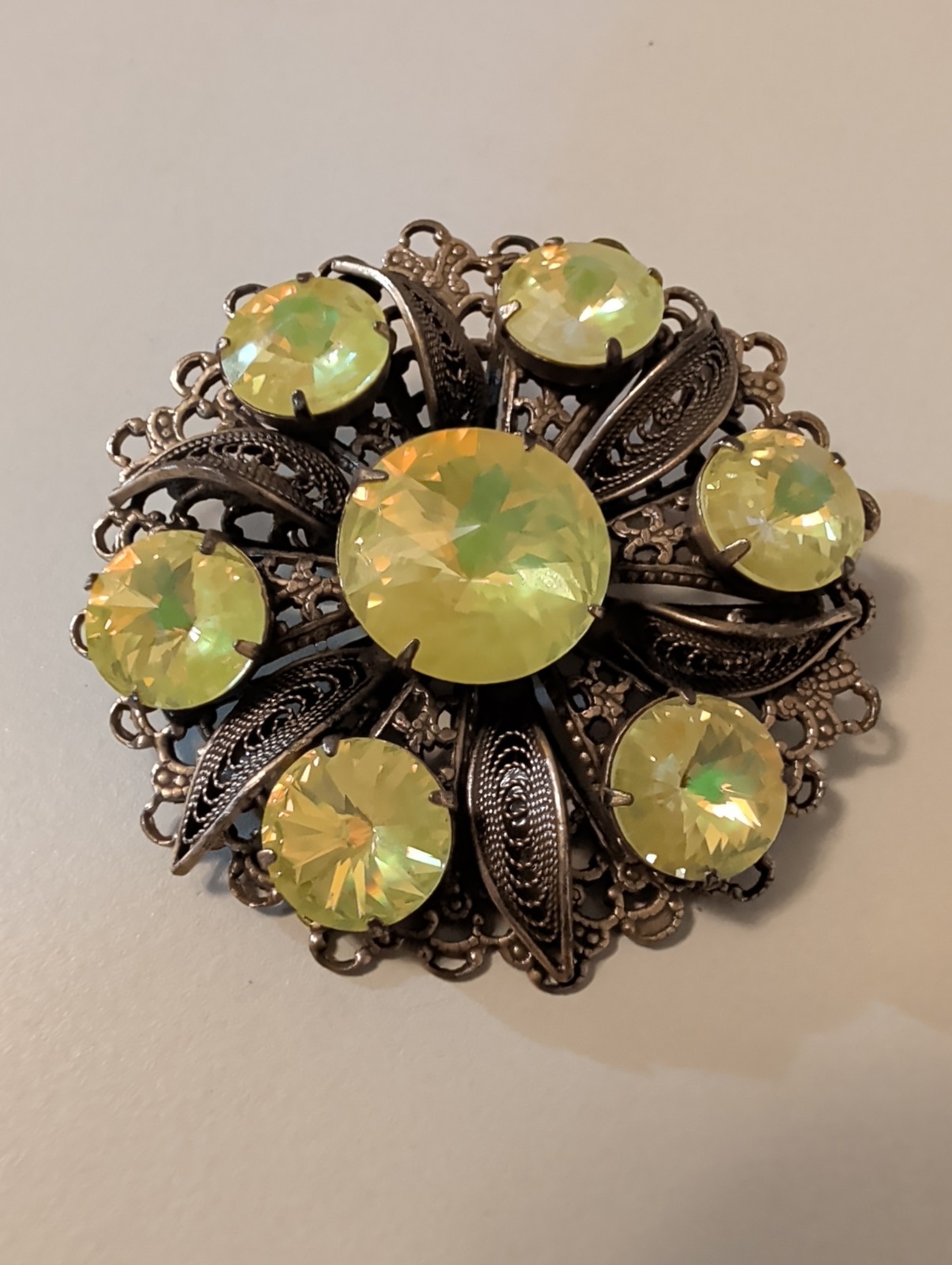Vintage filigree Bronze Tone Brooch. UV Reactive. 2.5″