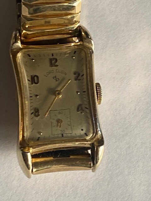 Lord Elgin 1955 14k Yellow Gold Filled Rectangular Curved Watch.run