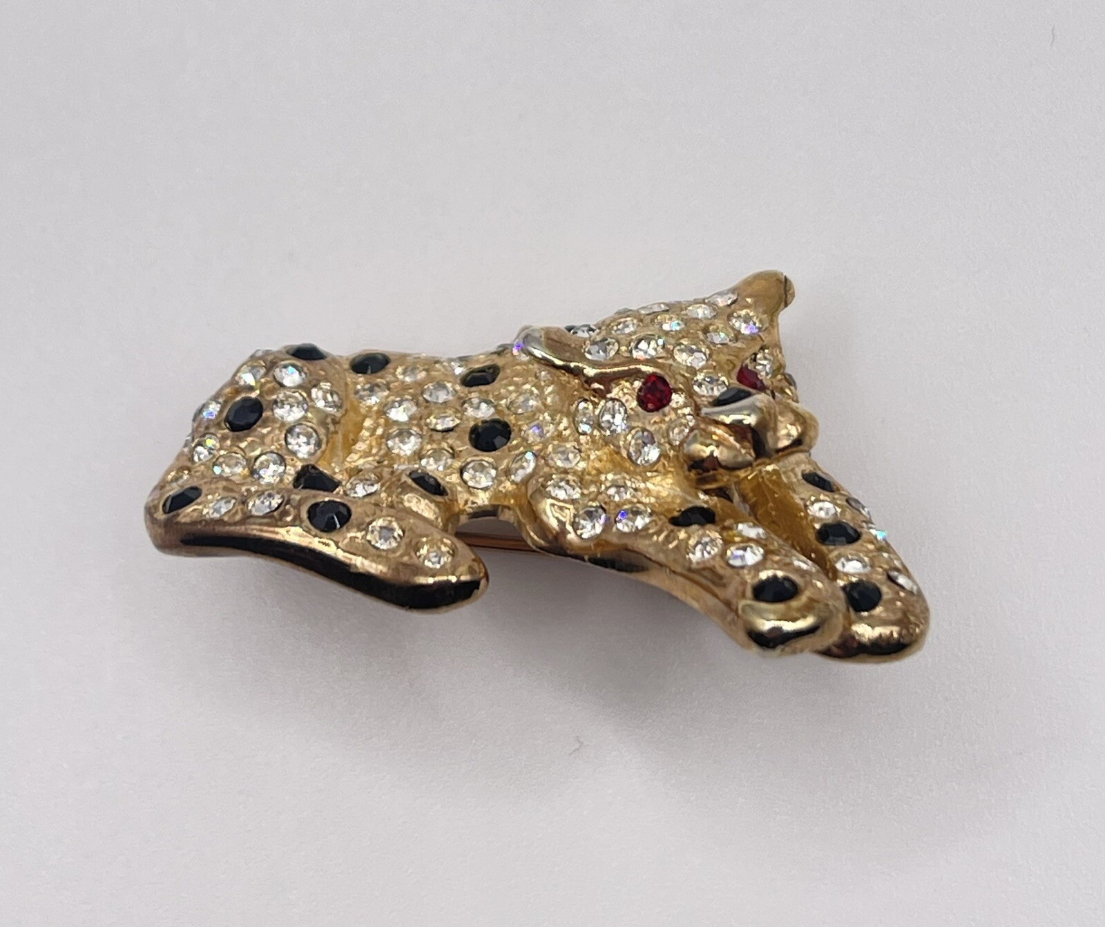 Vtg Signed Roman Black & Clear Pave’ Rhinestone Panther W/Red Eyes Brooch