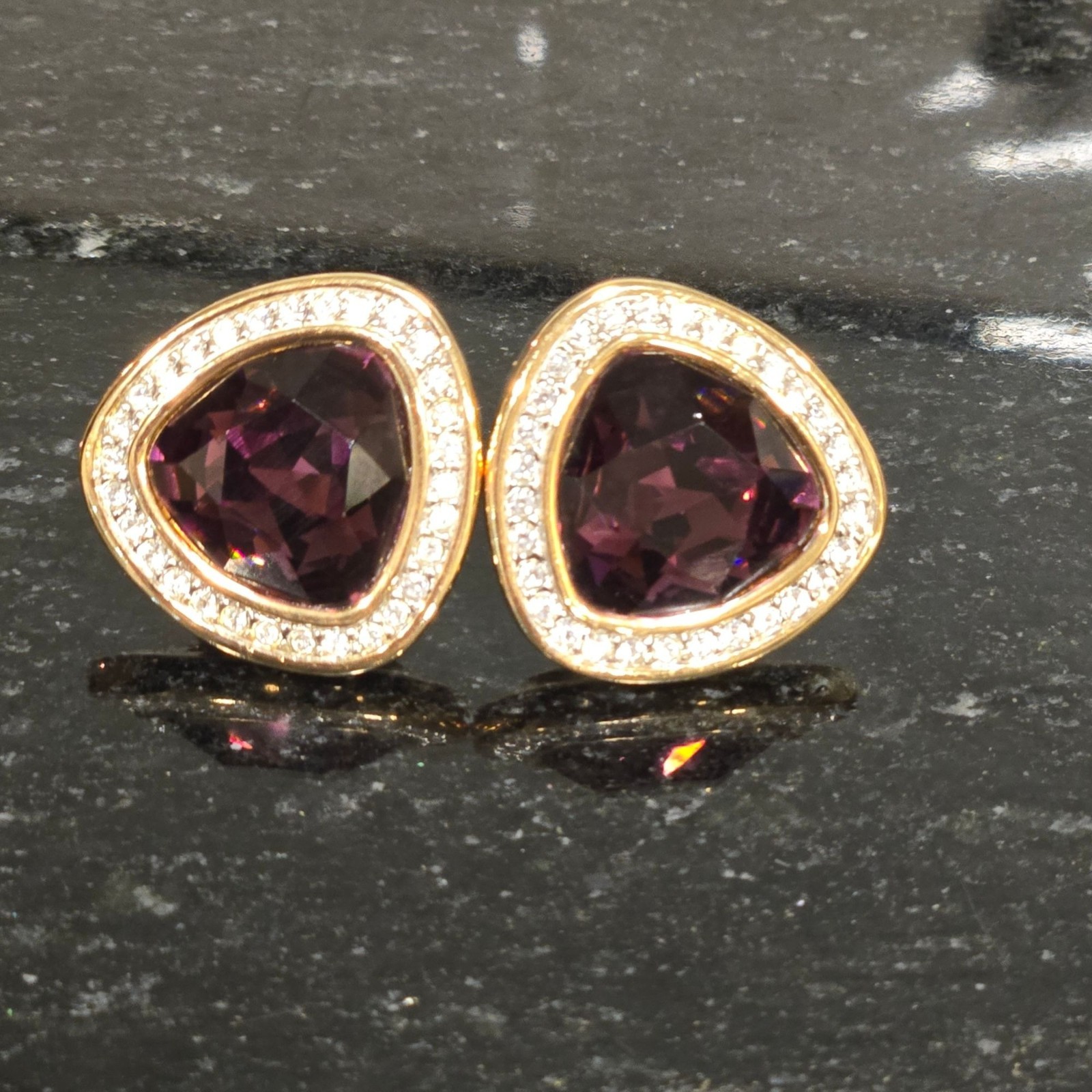 Vintage Swarovski Crystal earrings amethyst colored faceted stones clip on rare