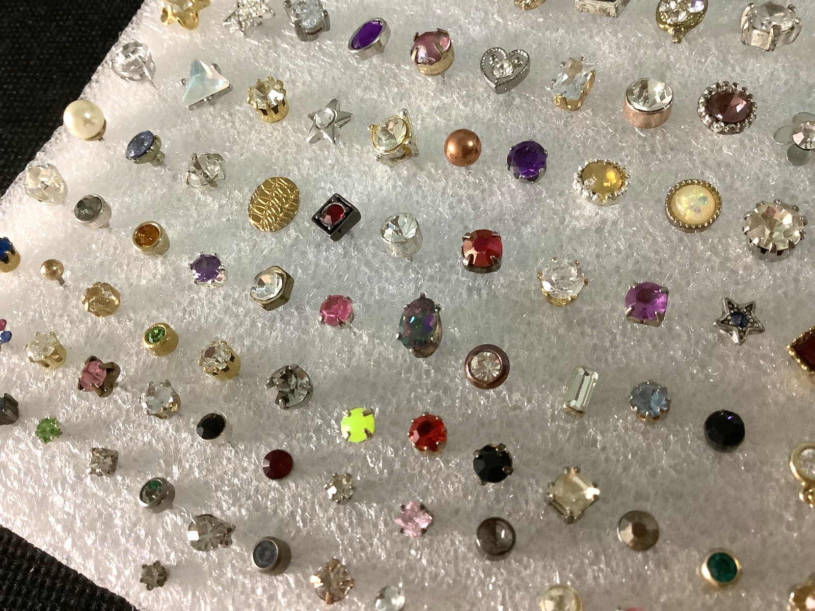 Huge lot of mixed vintage SINGLE stud earrings various unknown stones materials