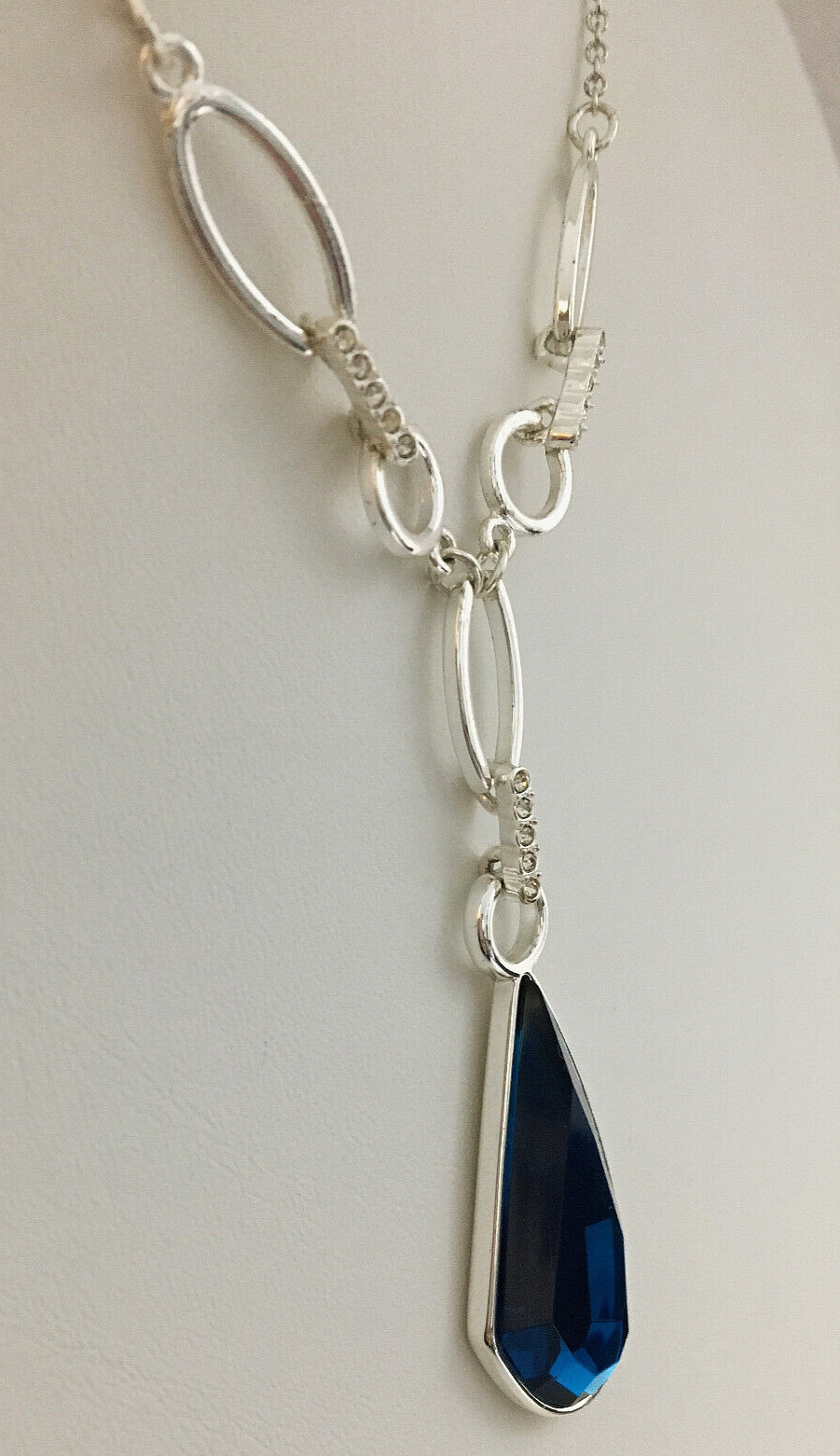 Silver Tone Necklace Blue Faceted Teardrop Pendant And Clear Rhinetone Accents