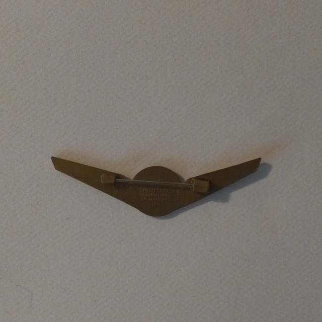Stoffel Seals Signed Wing Brooch Pin Gold Tone Green Round Bezel Center