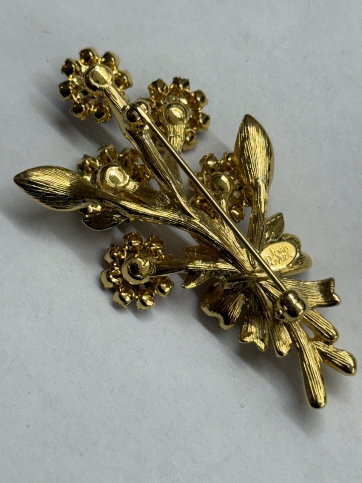 vintage signed joan rivers spinning flowers swarovski crystal brooch