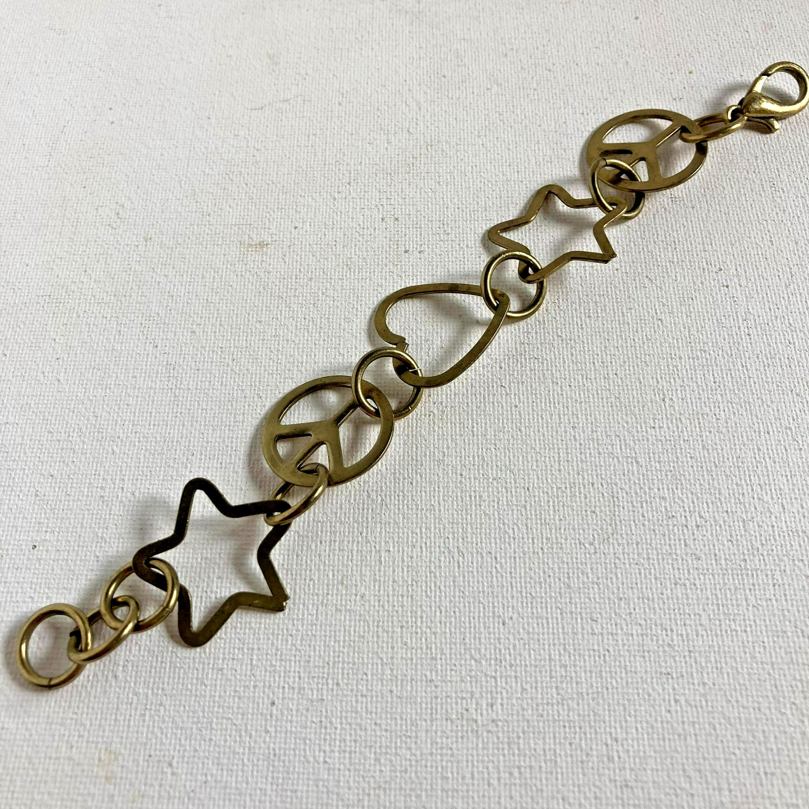 Bracelet Vintage Brass Chain of Hearts, Peace Signs and Stars 6.5″ Lobster clap