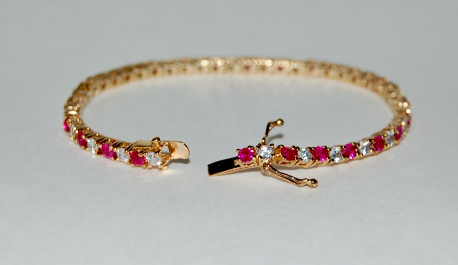 Gold Plated Sterling Silver 925 Ruby Red & Clear CZ Tennis Bracelet 7-1/4″