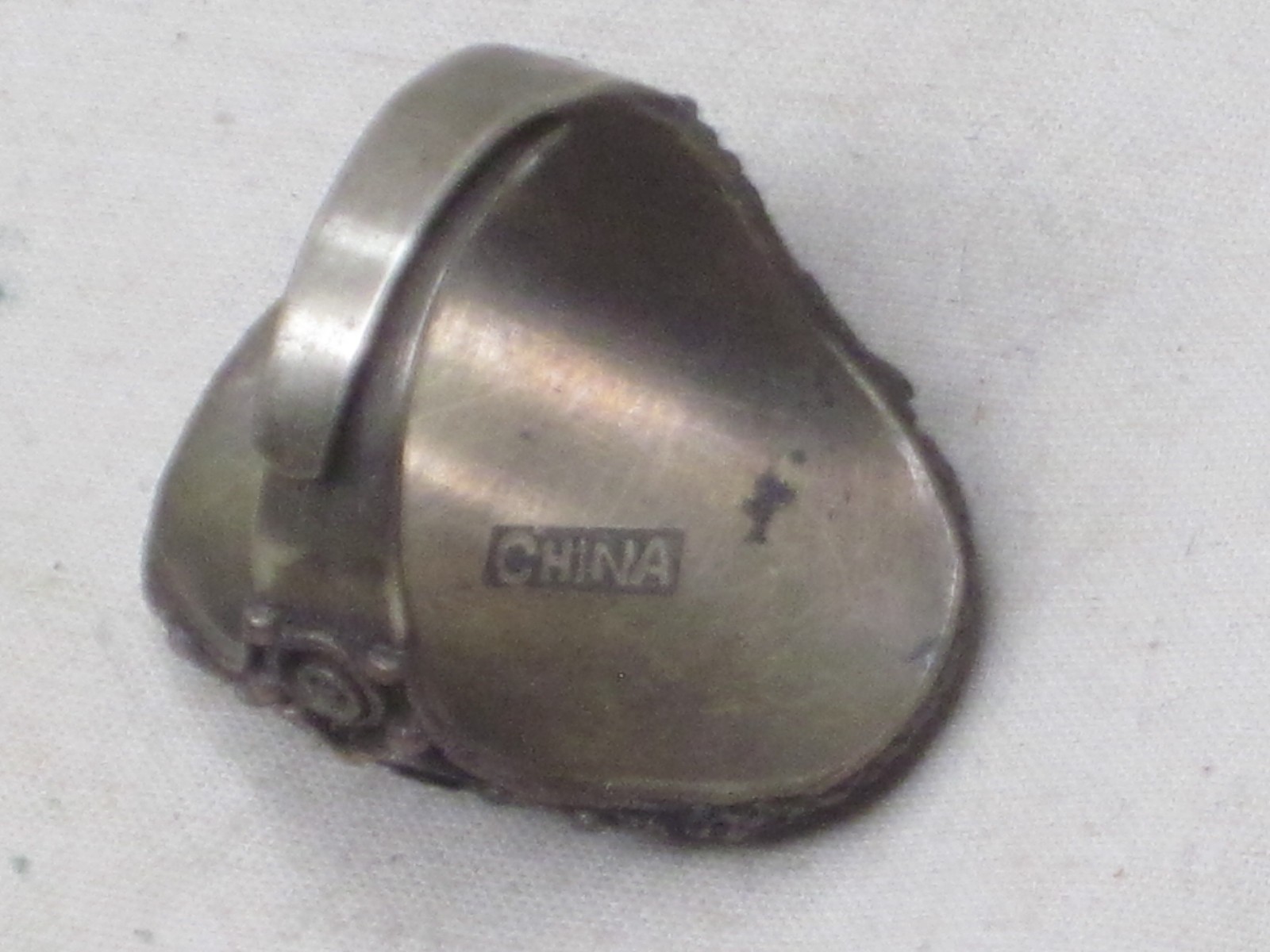vintage incomplete filigree ring marked CHINA * adjustable band no stone