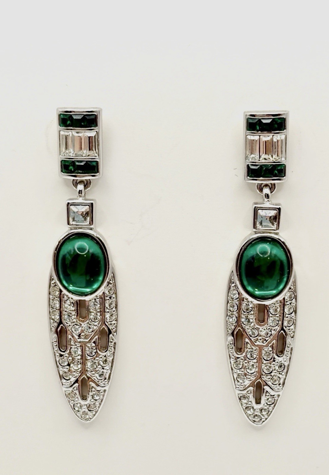Vintage, circa unknown, designed earrings signed and designed by V&A Museum Shop