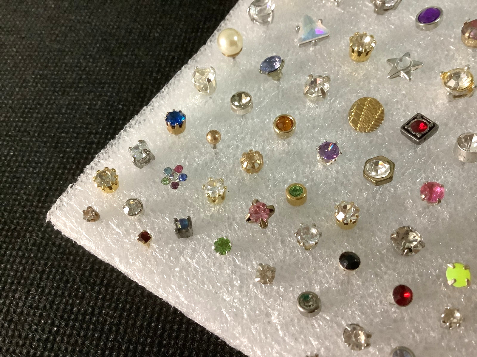 Huge lot of mixed vintage SINGLE stud earrings various unknown stones materials