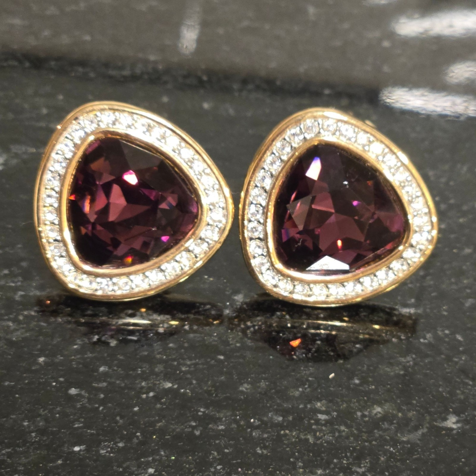 Vintage Swarovski Crystal earrings amethyst colored faceted stones clip on rare