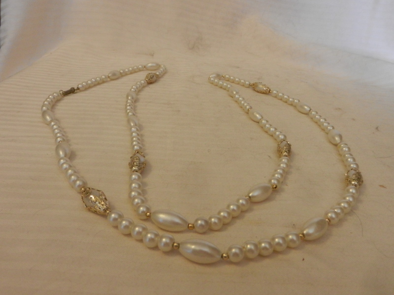 Vintage Stranded White Ball & Ovals with Silver Necklace 54″ Long from Hong Kong