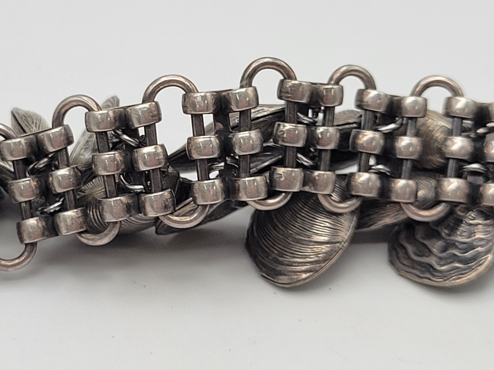 AS IS VINTAGE NAPIER EUGENE BARTOLLI SEASHELL CHARM BRACELET SILVER TONE