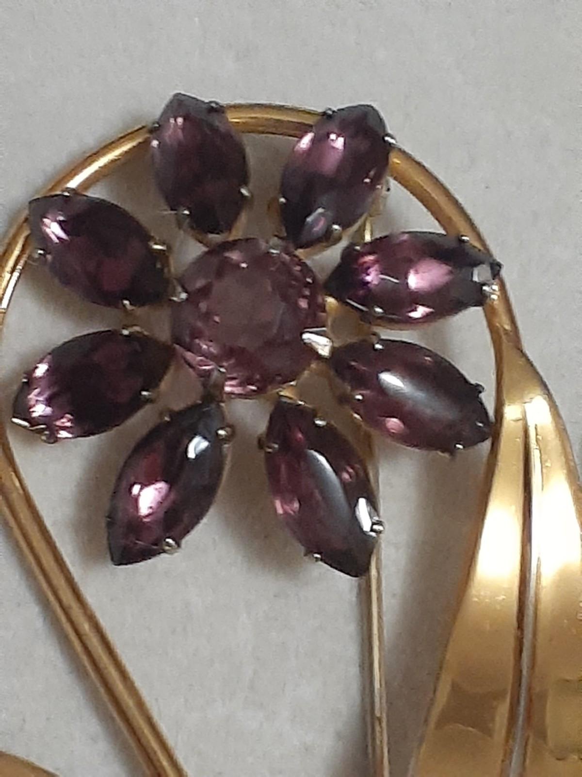Sterling silver gold plated prong set purple glass flower & stem leaf brooch