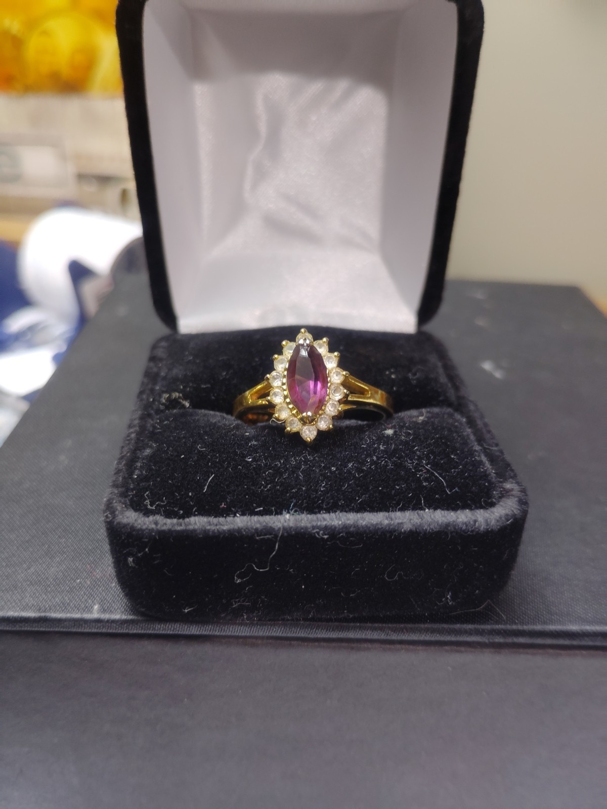 Vintage Amethyst Ring Set On An 18k Gold Band With White Saphire Accent Stones