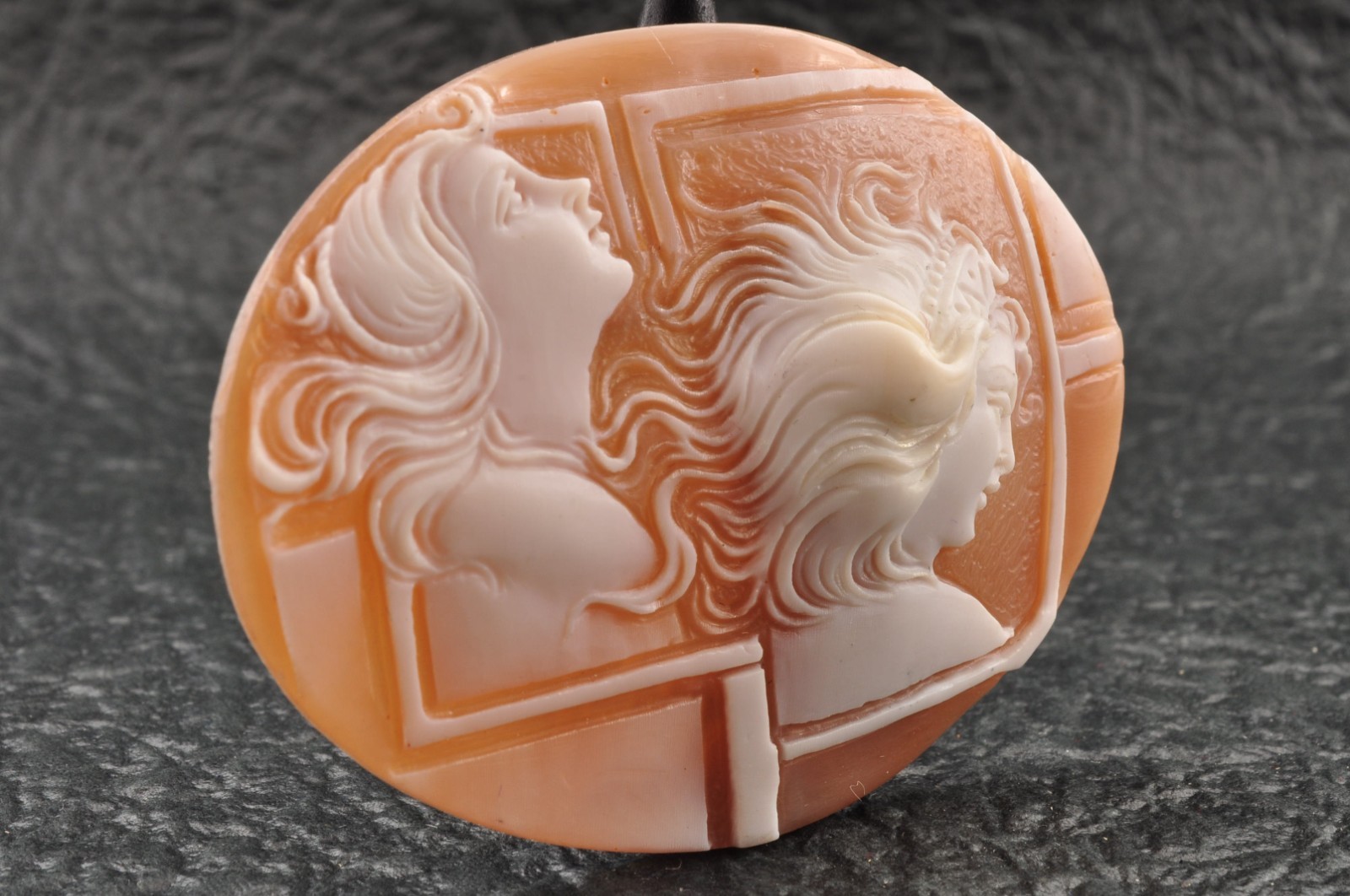 Vintage oval shape shell cameo “Two Girls” (64.0ct), sign by artist with case.