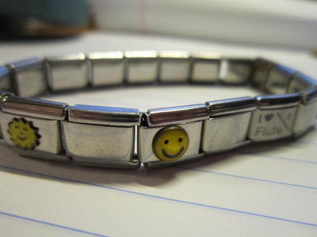 Stainless Steel Link Stretch Charm Bracelet Disney Lion King Diploma Flute Smile