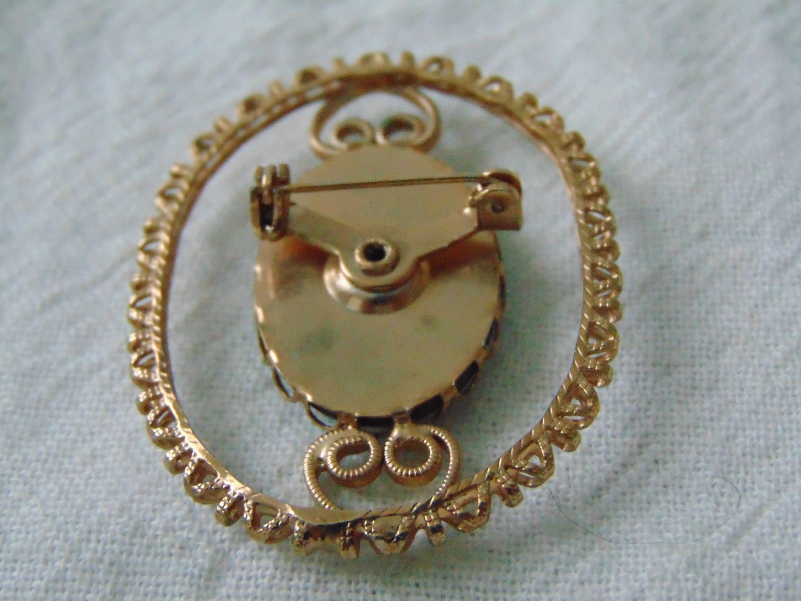 vintage antique gold plated cut out carved hematite intaglio cameo brooch