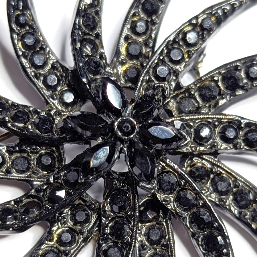 Vintage Mourning Brooch Black Rhinestone Japanned Pinwheel Signed Unreadable
