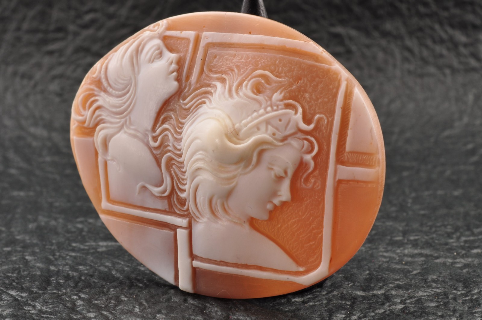 Vintage oval shape shell cameo “Two Girls” (64.0ct), sign by artist with case.