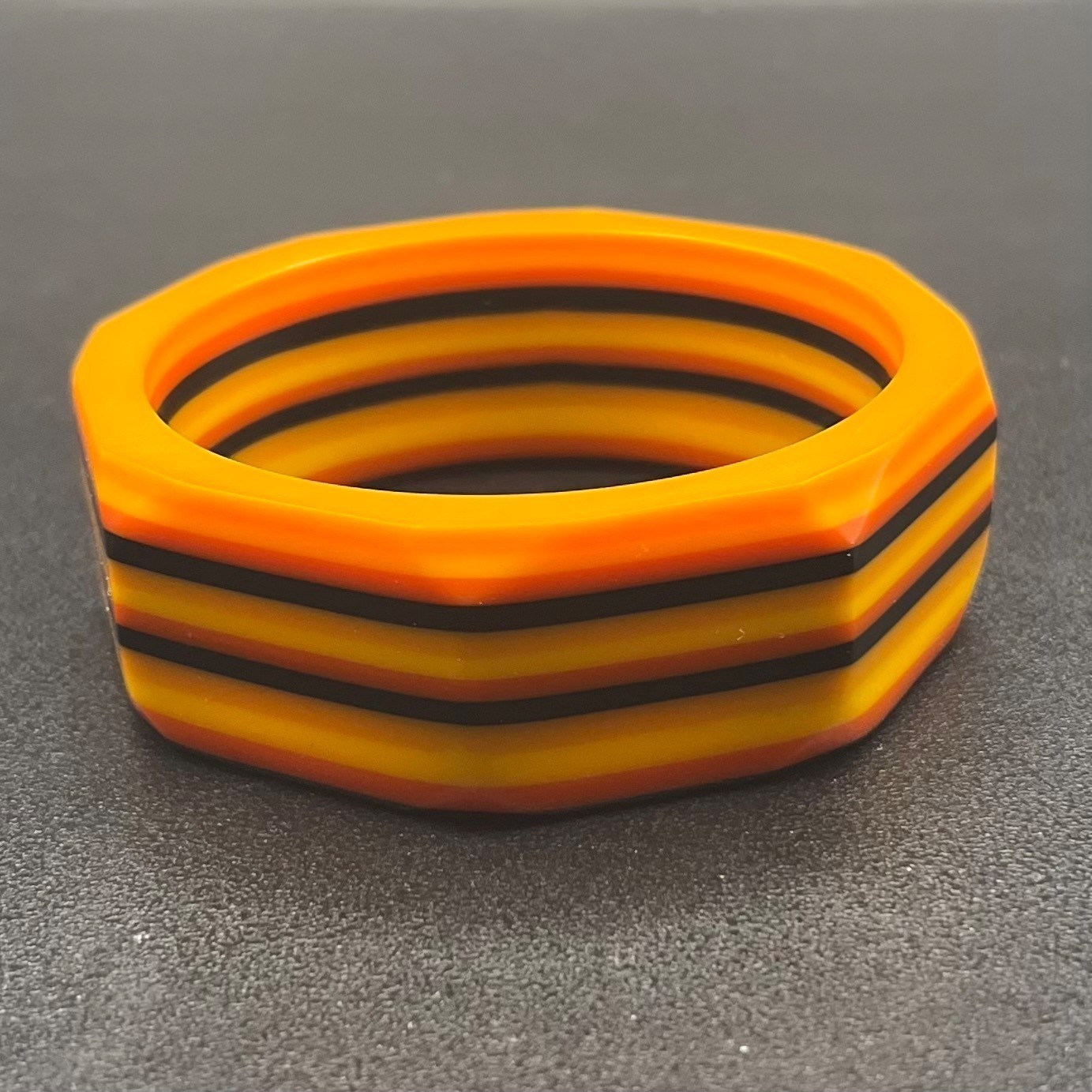 Vintage Laminated Lucite Octagonal Bangle Bracelet Orange Yellow Black Wide