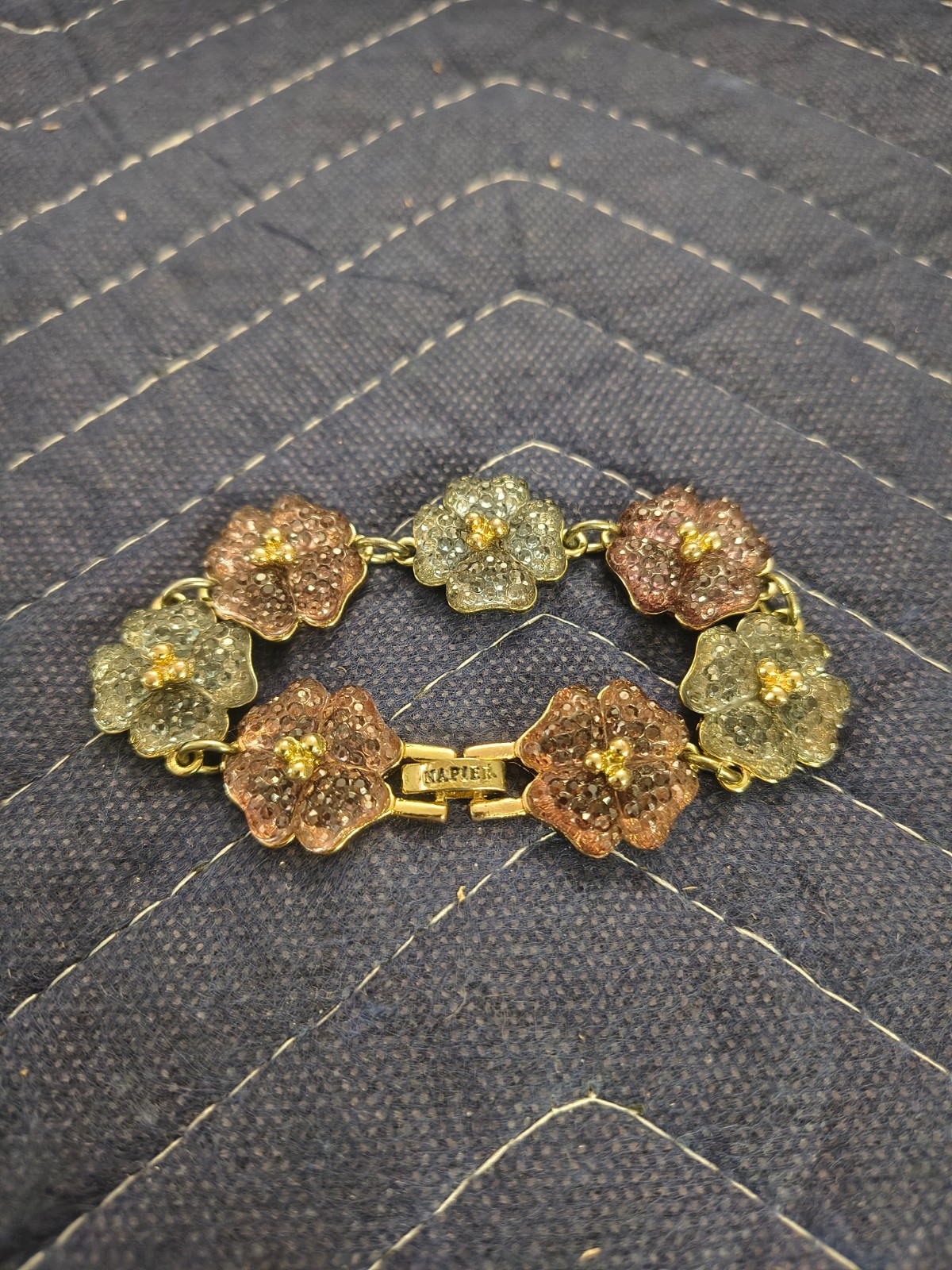 Napier Gold Tone Floral Bracelet See pictures for details 7 inches See Pictures