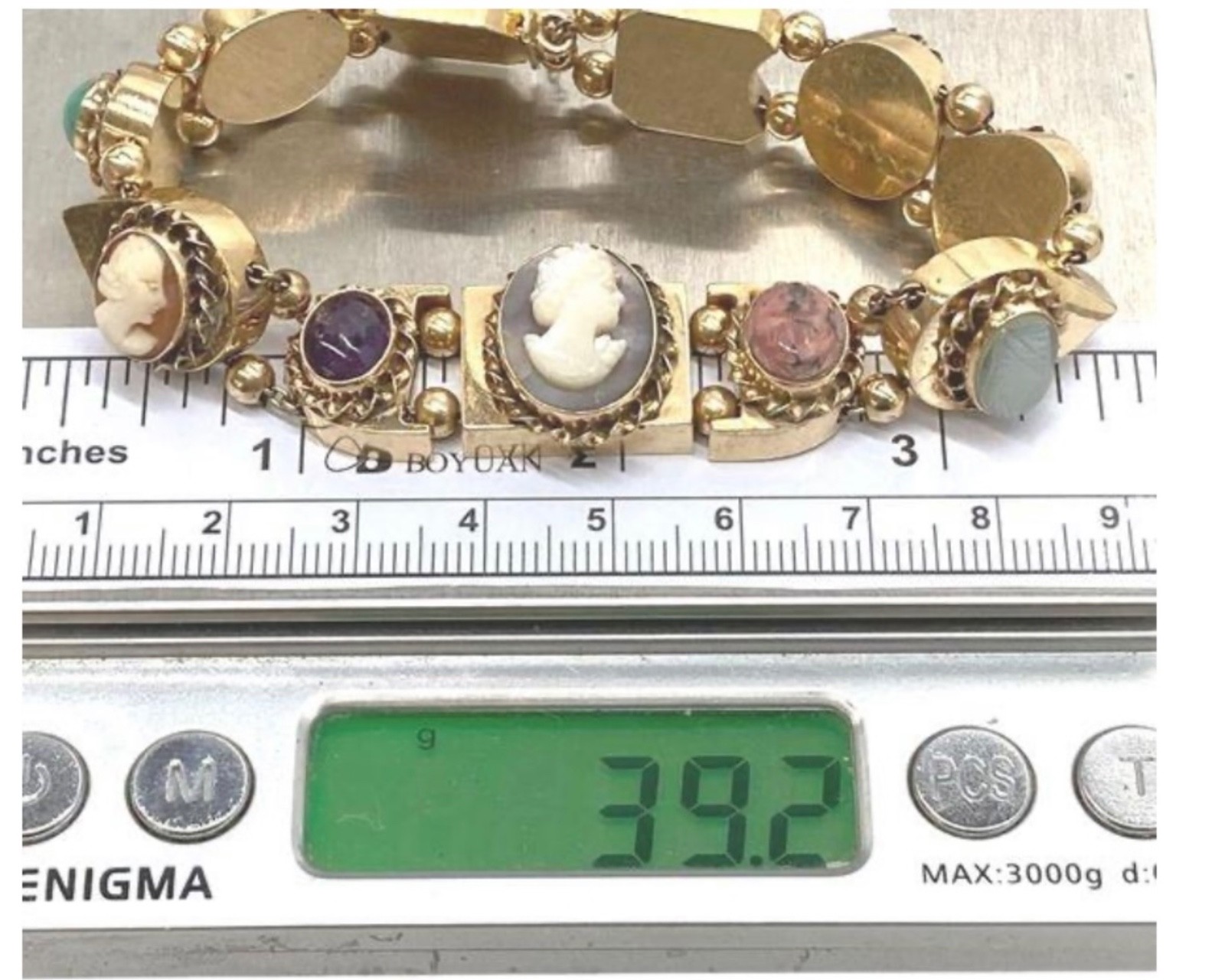 14k Gold ANTIQUE VICTORIAN GOLD CHARMS SLIDE BRACELET. CIRCA (1837-1901)