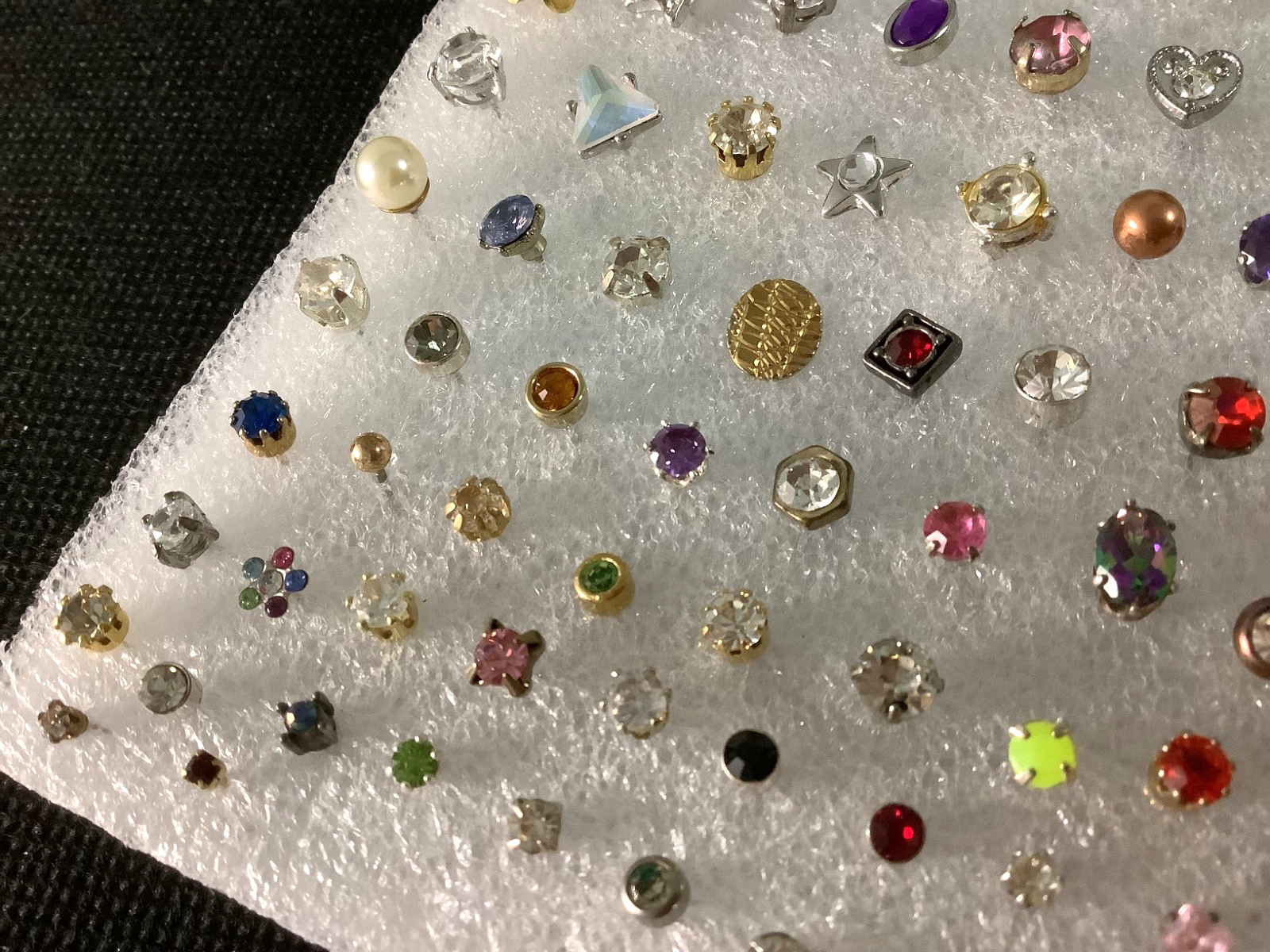 Huge lot of mixed vintage SINGLE stud earrings various unknown stones materials
