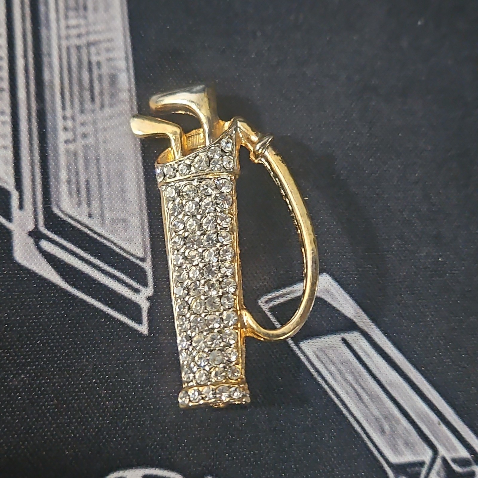 Women’s gold tone with rhinestone golf bag pin/Brooch.