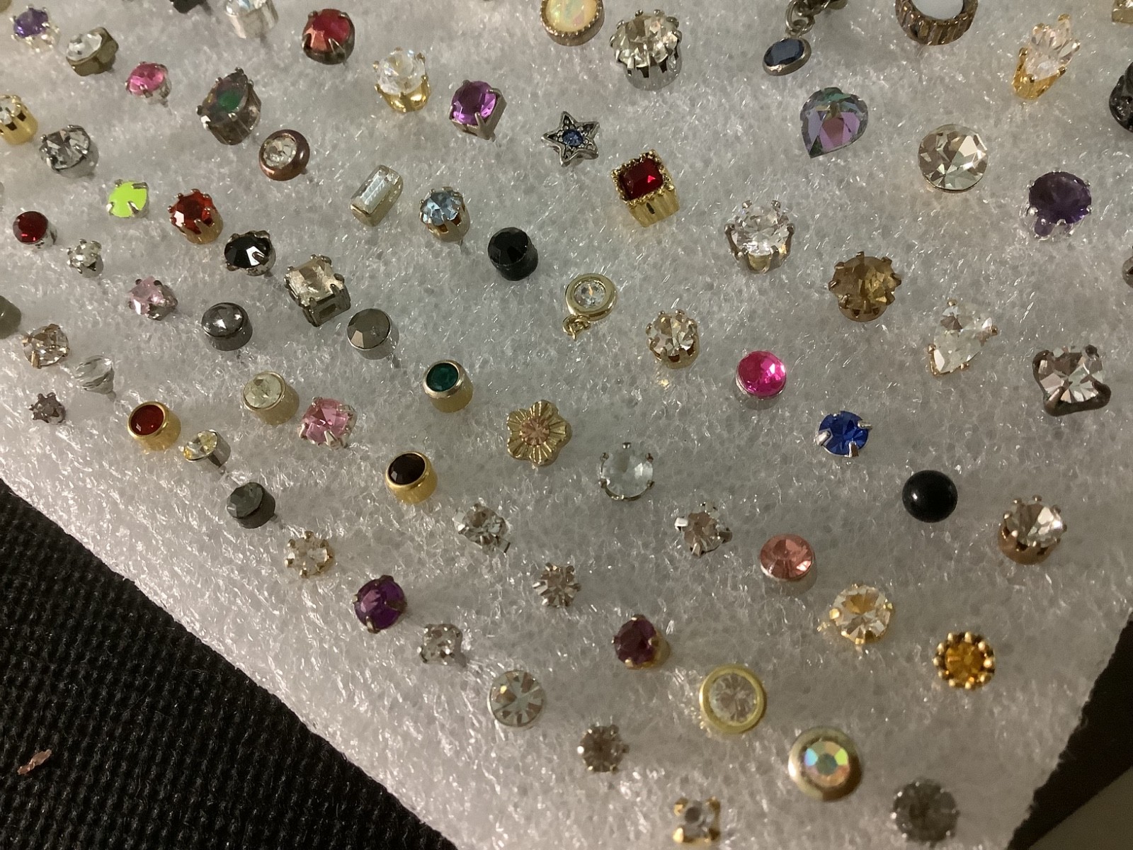 Huge lot of mixed vintage SINGLE stud earrings various unknown stones materials
