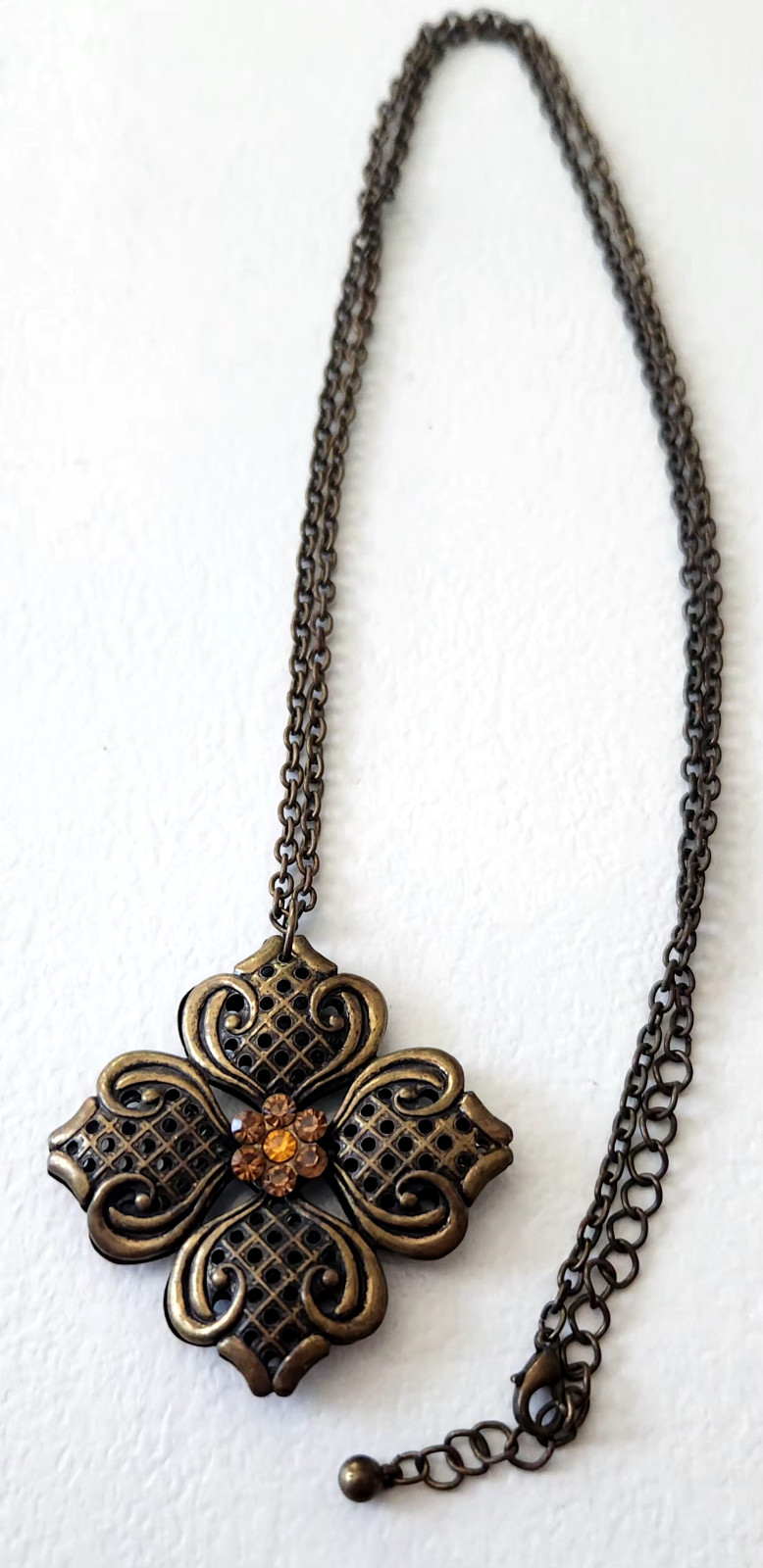 Antique necklace bronze/goldtone designed amber color flower quatrefoil pendant
