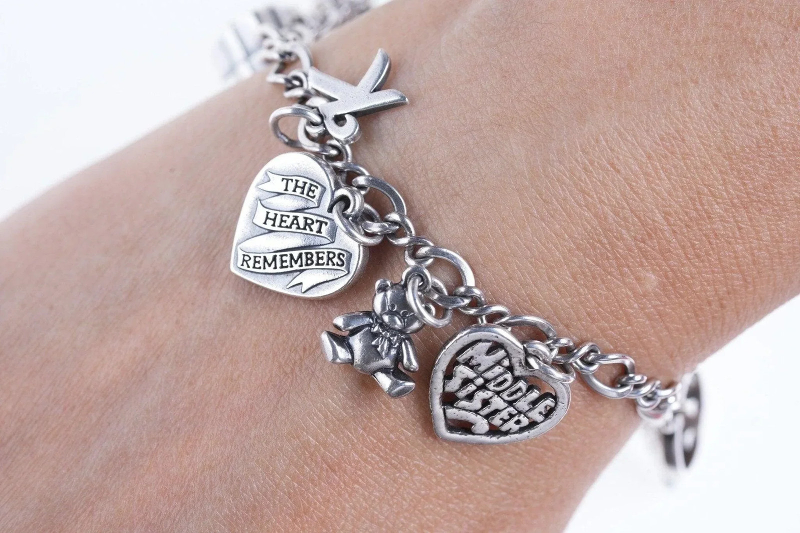 7.75″ James Avery Sterling silver Charm bracelet with lots of charms