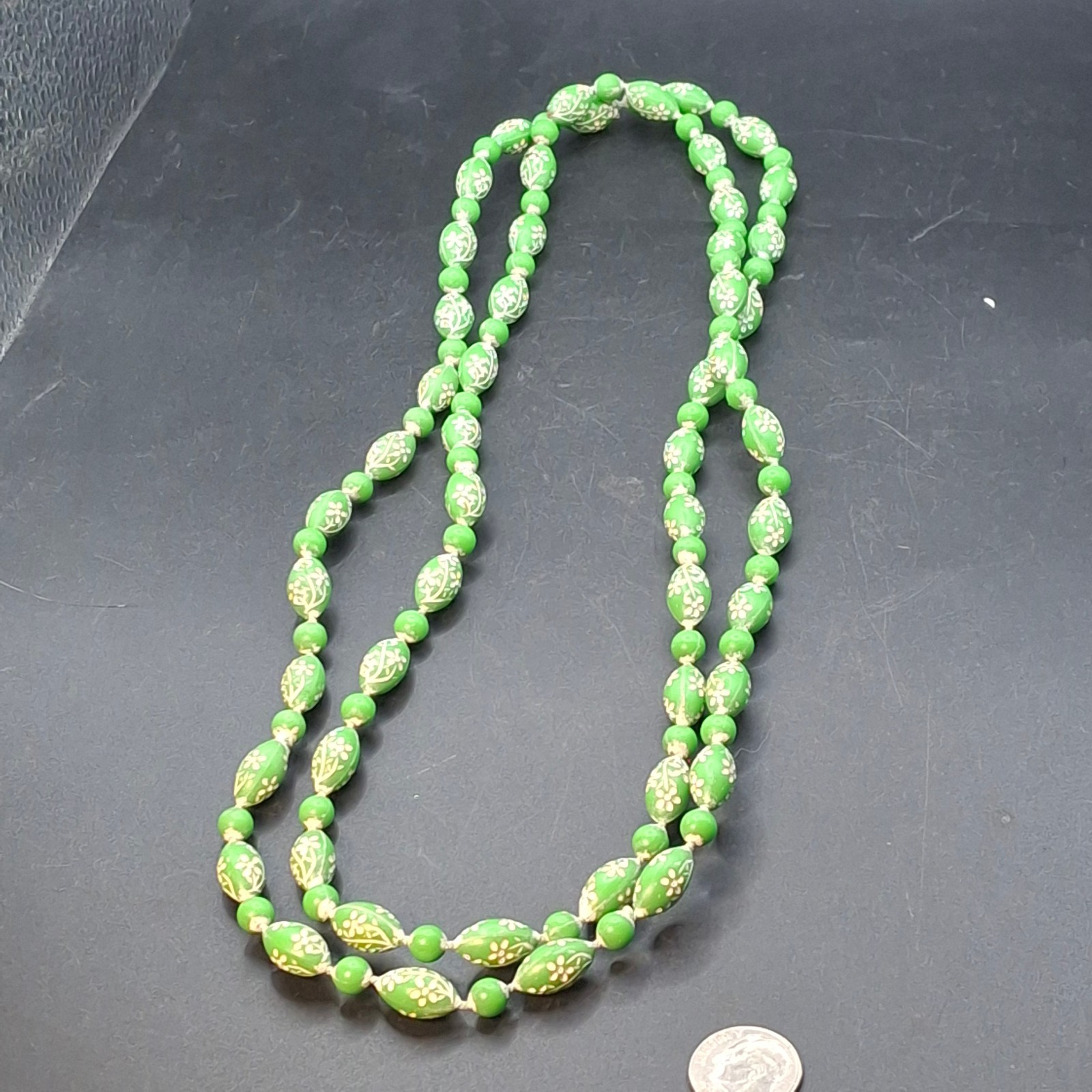 Vintage 44″ Long Grass Green & White Floral Barrel Plastic Bead Necklace