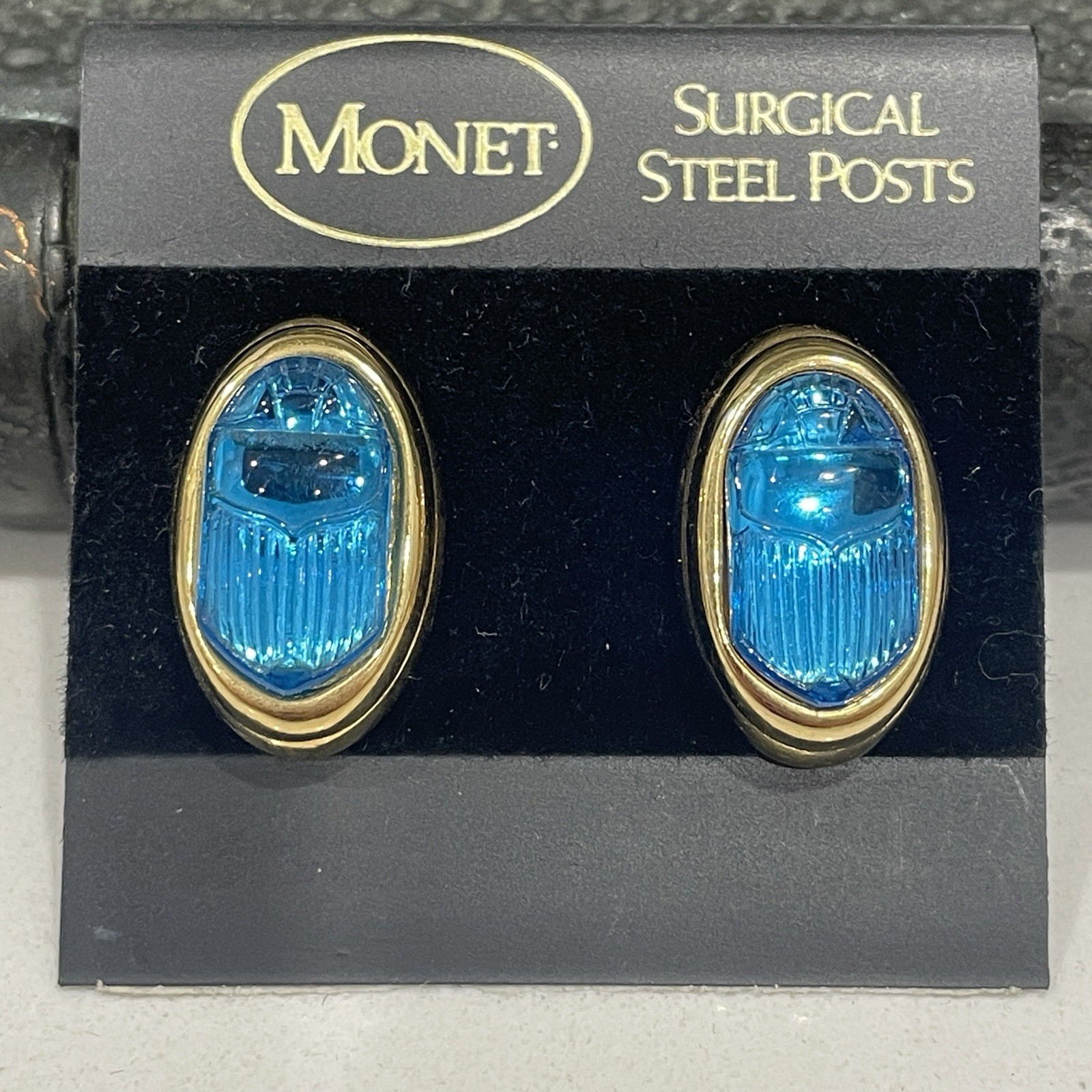 Vtg Monet Carved Blue Glass Scarab Earrings w Gold Tone Settings Mint on Card