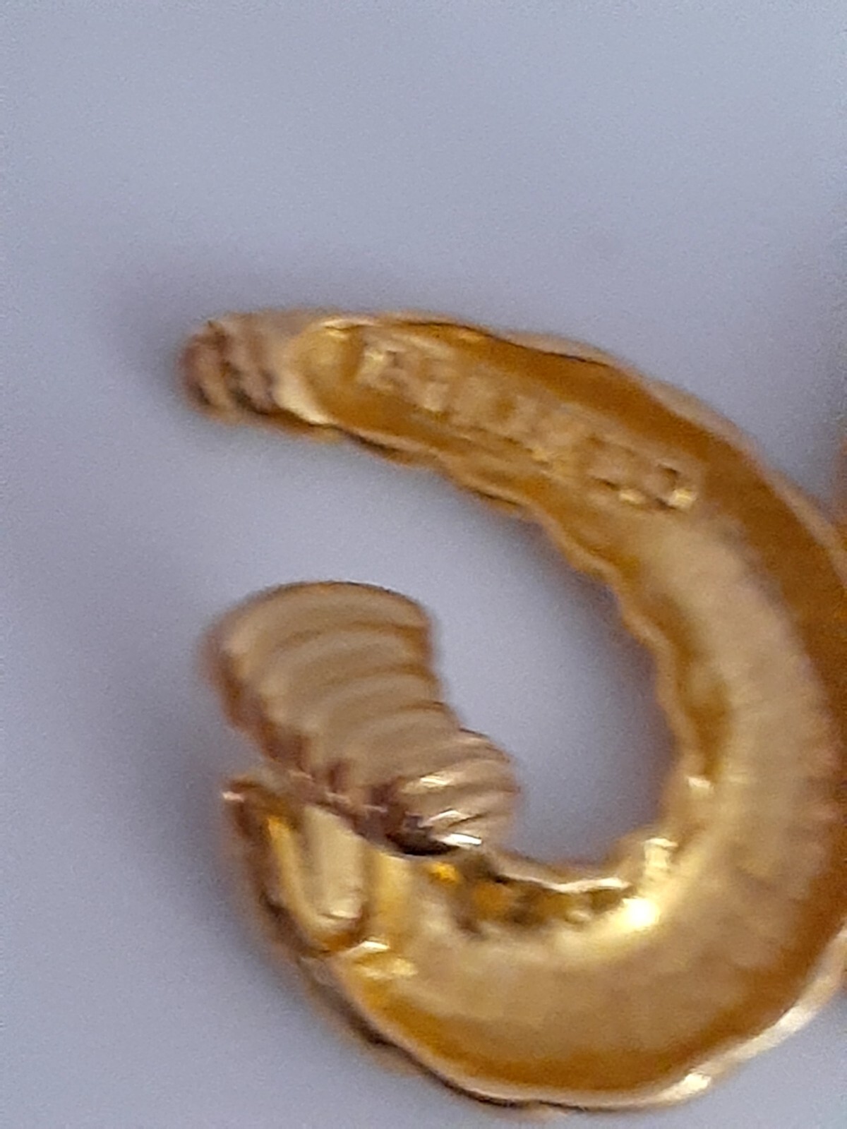 Lancer Gold tone ribbed hoop Huggie Clip on Earrings