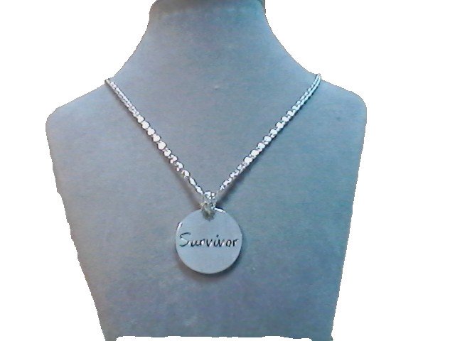 16″ vintage chain with a rhinestone bail holding a “survivor” charm