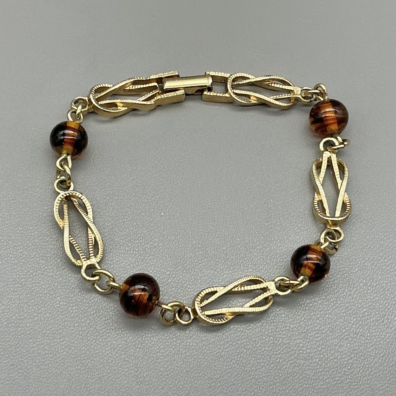 Avon Gold Tone Brown Glass Bead Chain Bracelet Snap Clasp Womens Fashion Jewelry