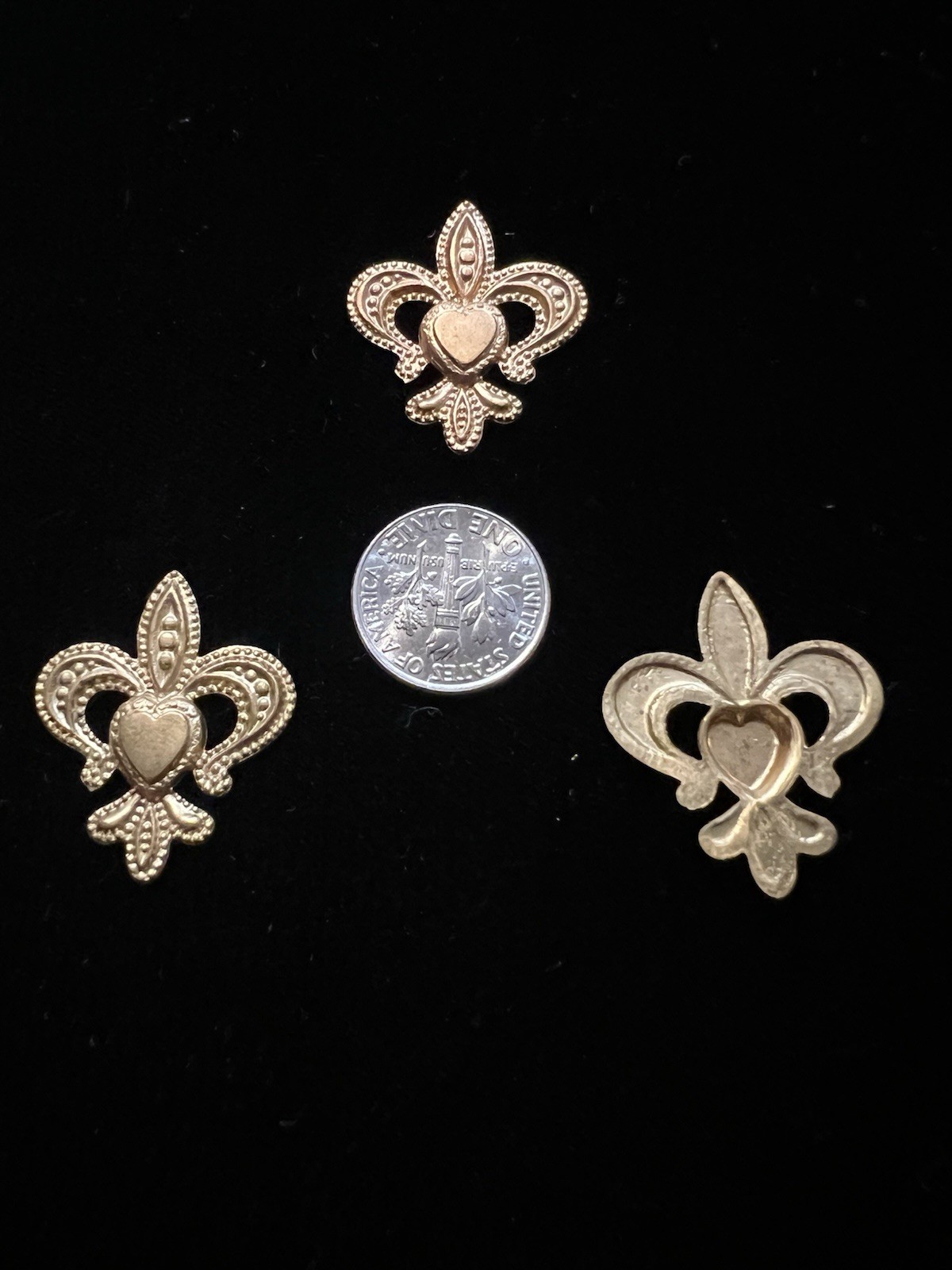 3 Vintage Brass Fleur De Lis Stampings from famous manufacturer Providence R.I.