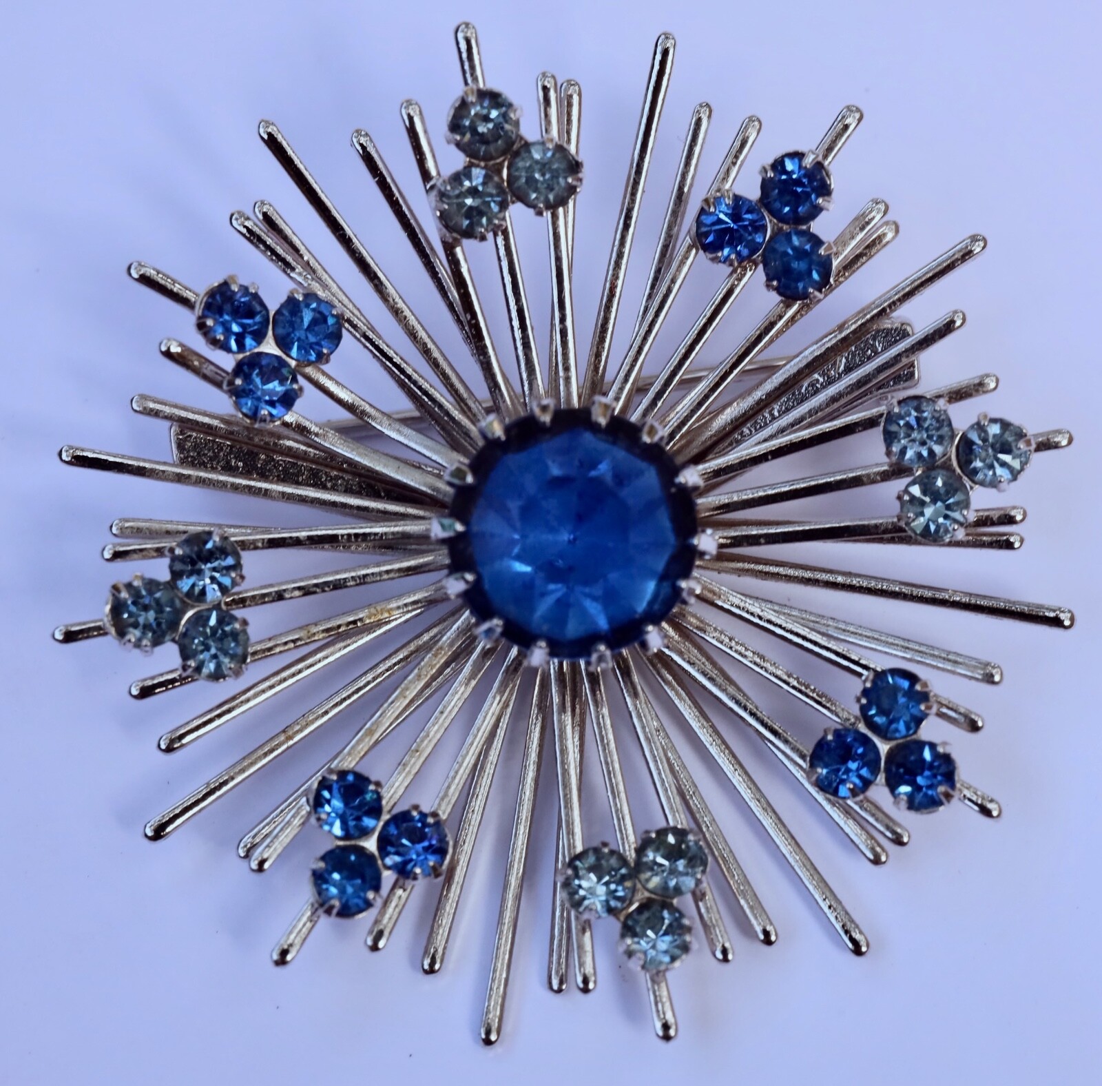 Sarah Coventry Signed “Coventry” Silver Tone Starburst Brooch Blue Rhinestones