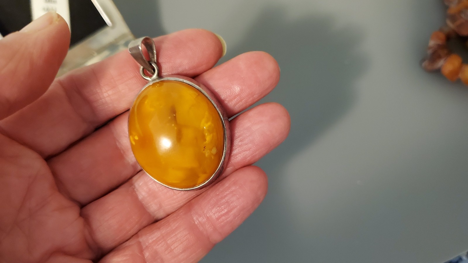 Vintage Lithuania butterscotch amber box and huge sterling pendant set