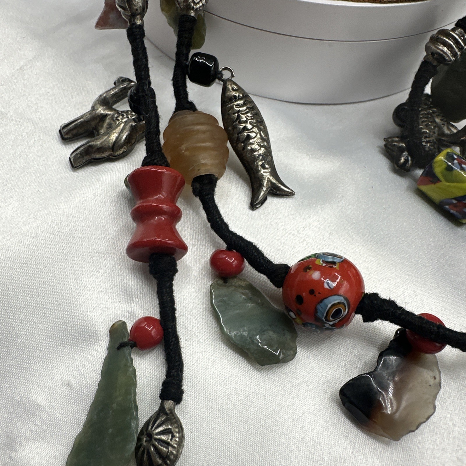 Vtg Indian Glass Beads Stone Nuggets and Seven Puffed Animals Cord Necklace.Read