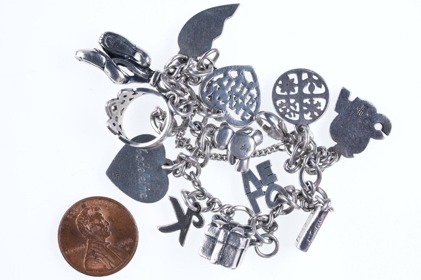 7.75″ James Avery Sterling silver Charm bracelet with lots of charms