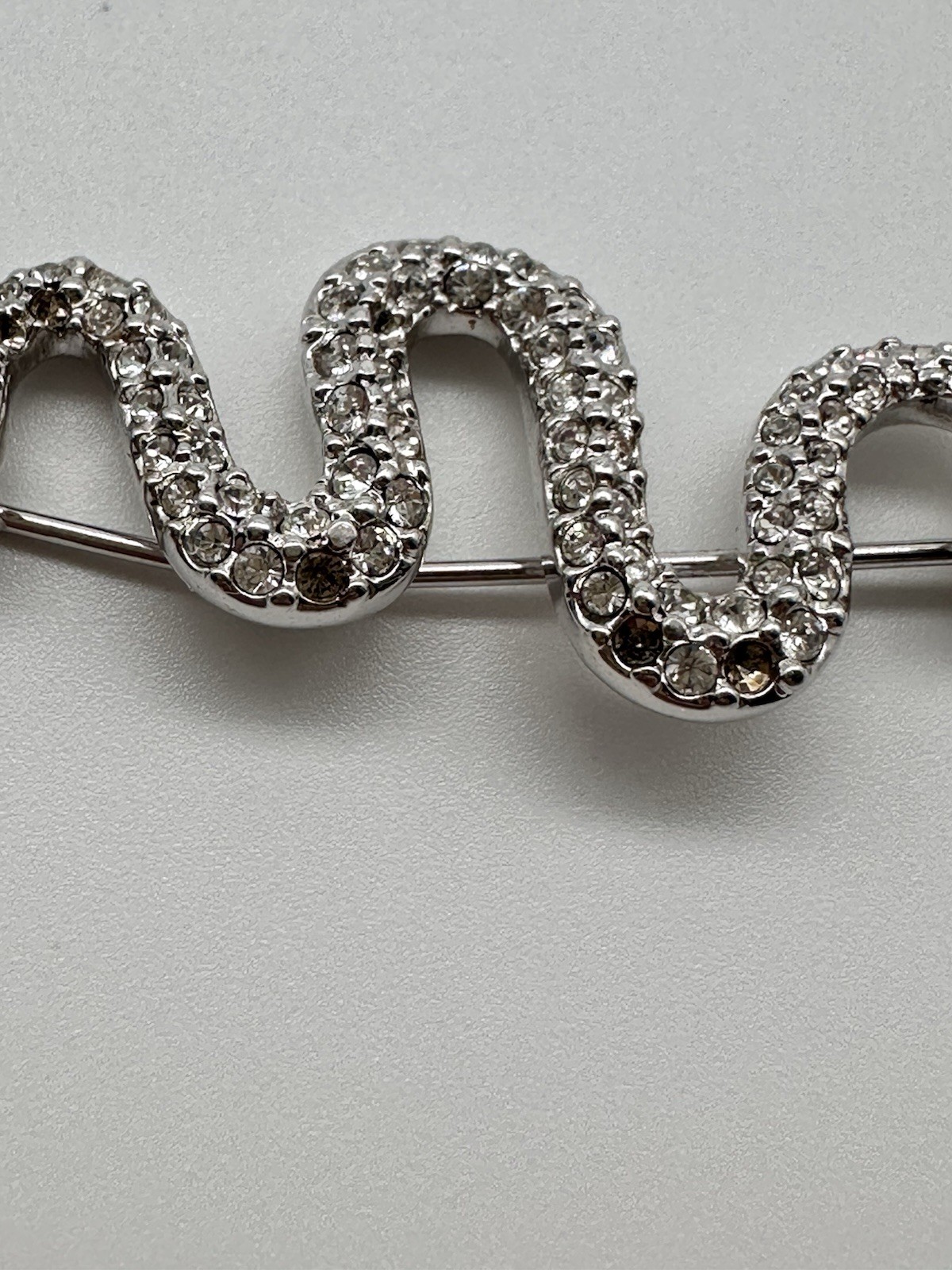 Vintage Swarovski Swan Silver tone Pave Crystal Snake brooch green eyes