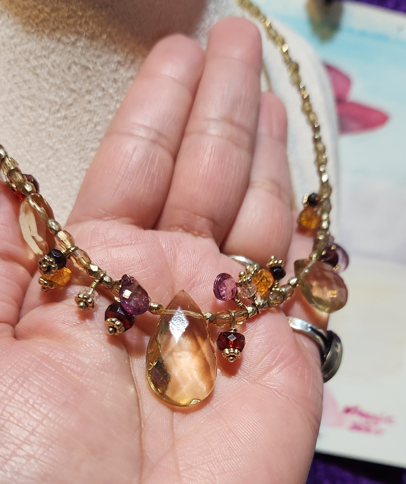 Vtg Cookie Lee faceted Purples/Yellows Lucite Charm Necklace on pale Gold chain