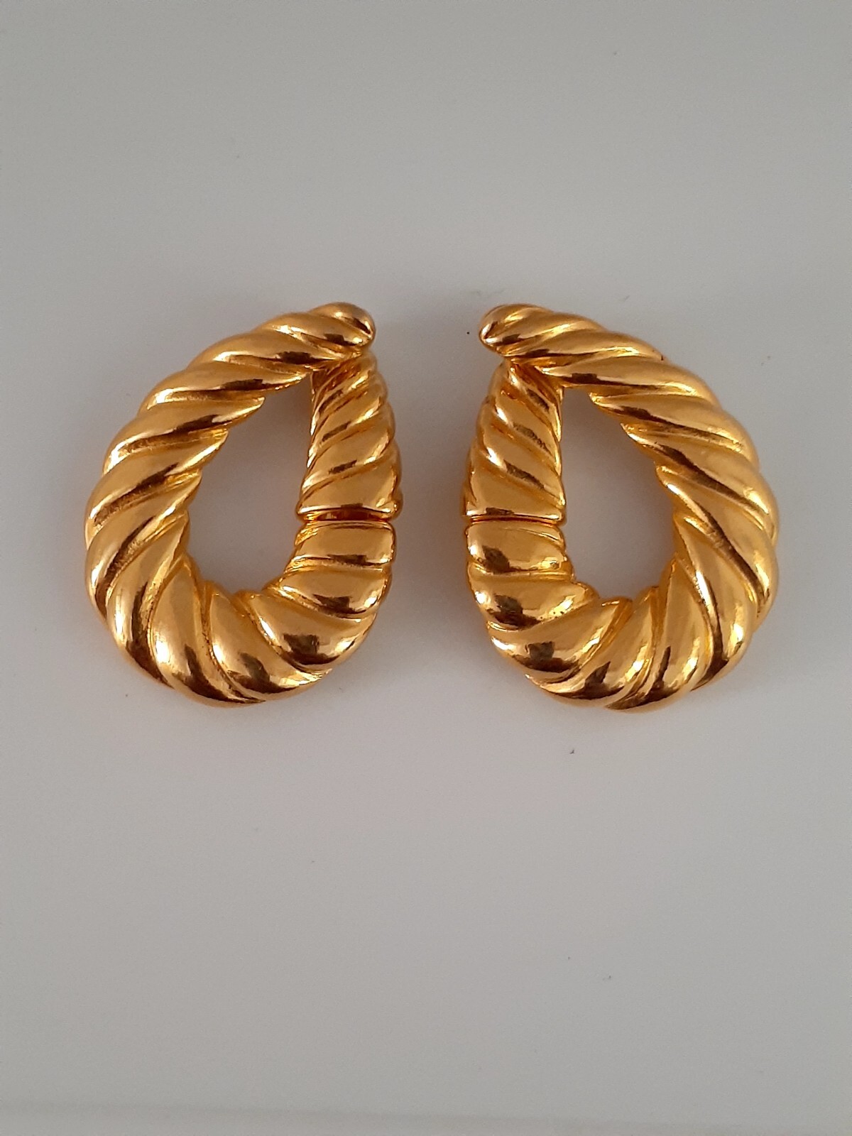 Lancer Gold tone ribbed hoop Huggie Clip on Earrings