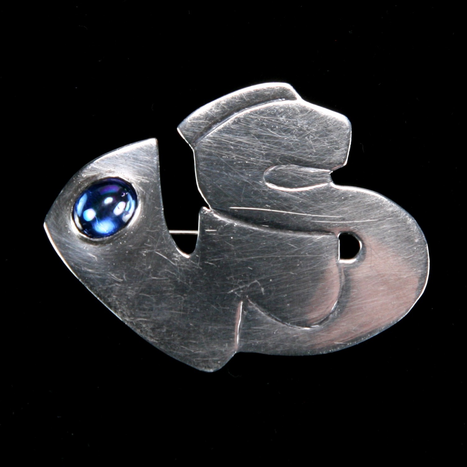 Stylized “WS” Brooch in Silver with Blue Glass Cabochon