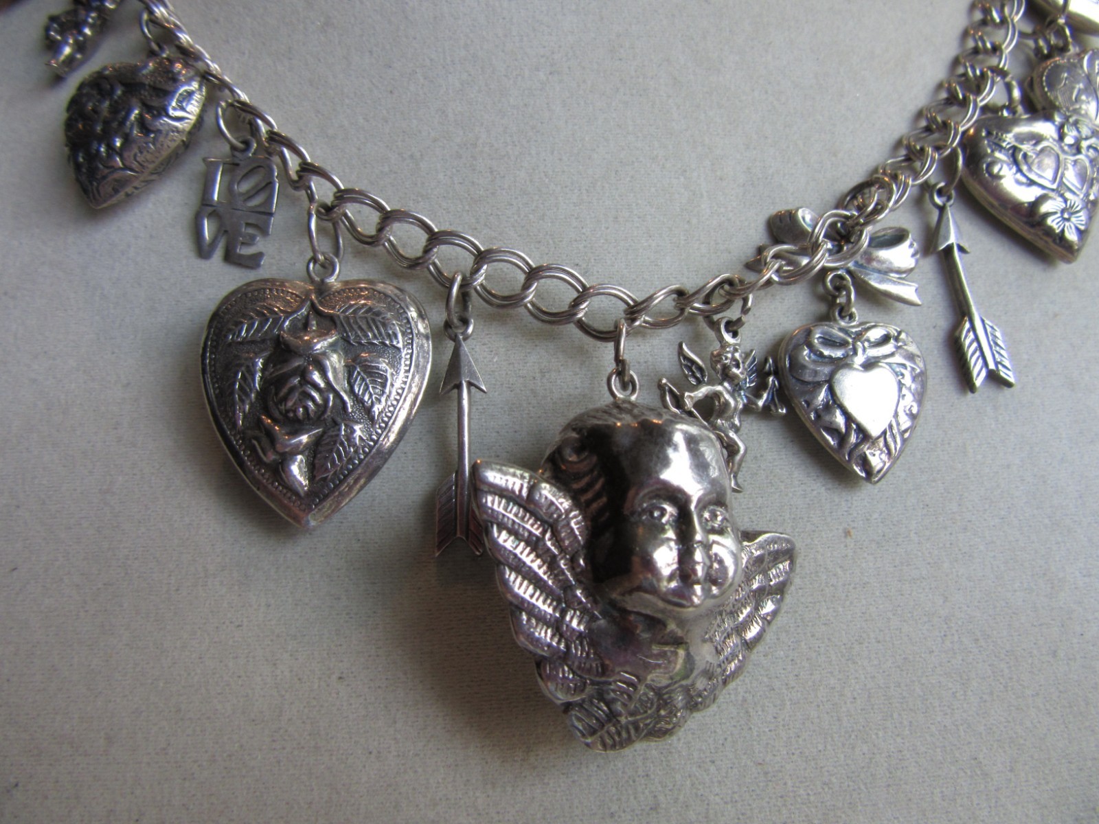Vintage double link chain necklace with 22 heart, love themed charms 61.8 grams