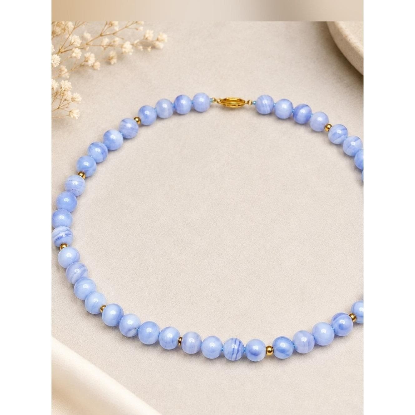 Vintage pale blue banded bead necklace, possibly chalcedony or blue lace agate